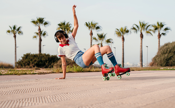 A roller-skater wearing headphones bought with Virgin Money point rewards.