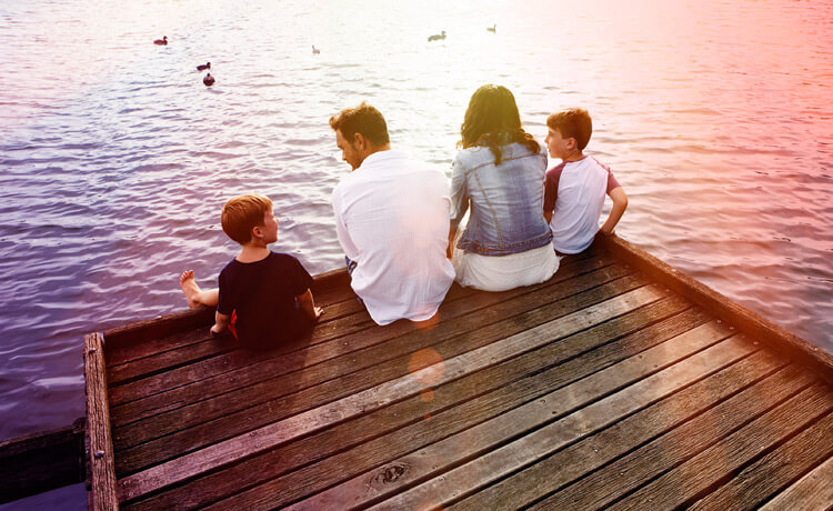 Family on jetty